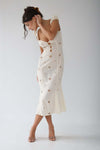 Robe midi féminine à fleurs brodées blanche - style chic pour le jour et le soir