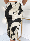 Jupe midi à motif abstrait - design élégant qui met en valeur la silhouette féminine