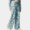 Jean large femme en denim bleu à fleurs