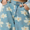 Jean large femme en denim bleu à fleurs