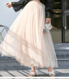 Jupe en tulle plissée midi pour femme - design superposé polyvalent pour les occasions décontractées ou formelles