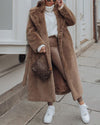 Manteau long en fausse fourrure - vêtement douillet pour femmes avec ceinture