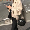 Manteau oversize en mélange de laine - élégance féminine