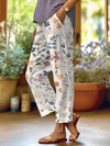 Pantalons blancs à imprimé floral - élégants et fleuris pour femmes