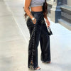 Pantalons en simili-cuir - élégants pantalons noirs pour femmes avec détails en perles
