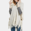 Poncho beige - un pull poncho à capuche tendance pour femmes