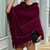 Poncho en maille rouge pour femmes - élégant avec des détails raffinés