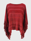 Poncho féminin avec franges - élégant wrap en tricot