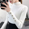 Pull col roulé - haut féminin avec détails en bouton
