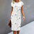 Robe à fleurs - charmante robe blanche d'été pour femmes