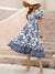 Robe fluide à motifs floraux - élégante robe blanche et bleue pour femmes