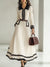 Robe midi tricotée - une élégance intemporelle avec ceinture