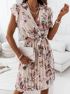 Robe portefeuille fleuri - élégante robe plissée avec décolleté en v