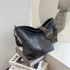 Sac à main en cuir - sac à épaule chic avec une bandoulière motif