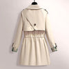 Trench-coat - élégant manteau ceinturé pour dames