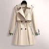 Trench-coat - élégant manteau ceinturé pour dames